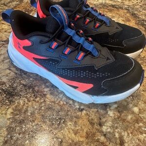 Kids UA Black and orange Athletic Shoes